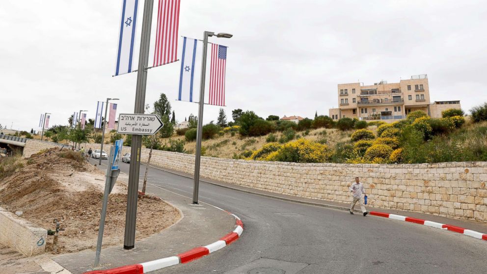 PHOTO: A new road sign and flags are placed at the road leading to the U.S. consulate in the Jewish neighborhood of Arnona on the East-West Jerusalem line in Jerusalem, May 8, 2018.