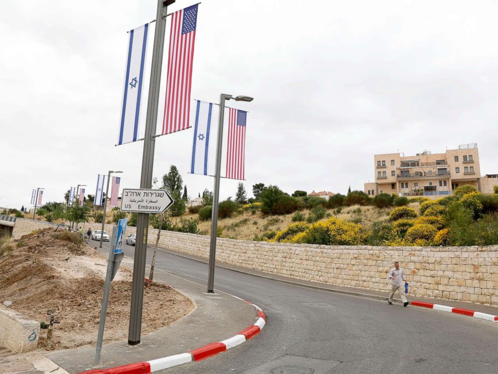 PHOTO: On the road leading to the US Consulate in the Jewish quarter of Arnona to the east-west, a new street sign and flags are set Jerusalem Line in Jerusalem, May 8, 2018.