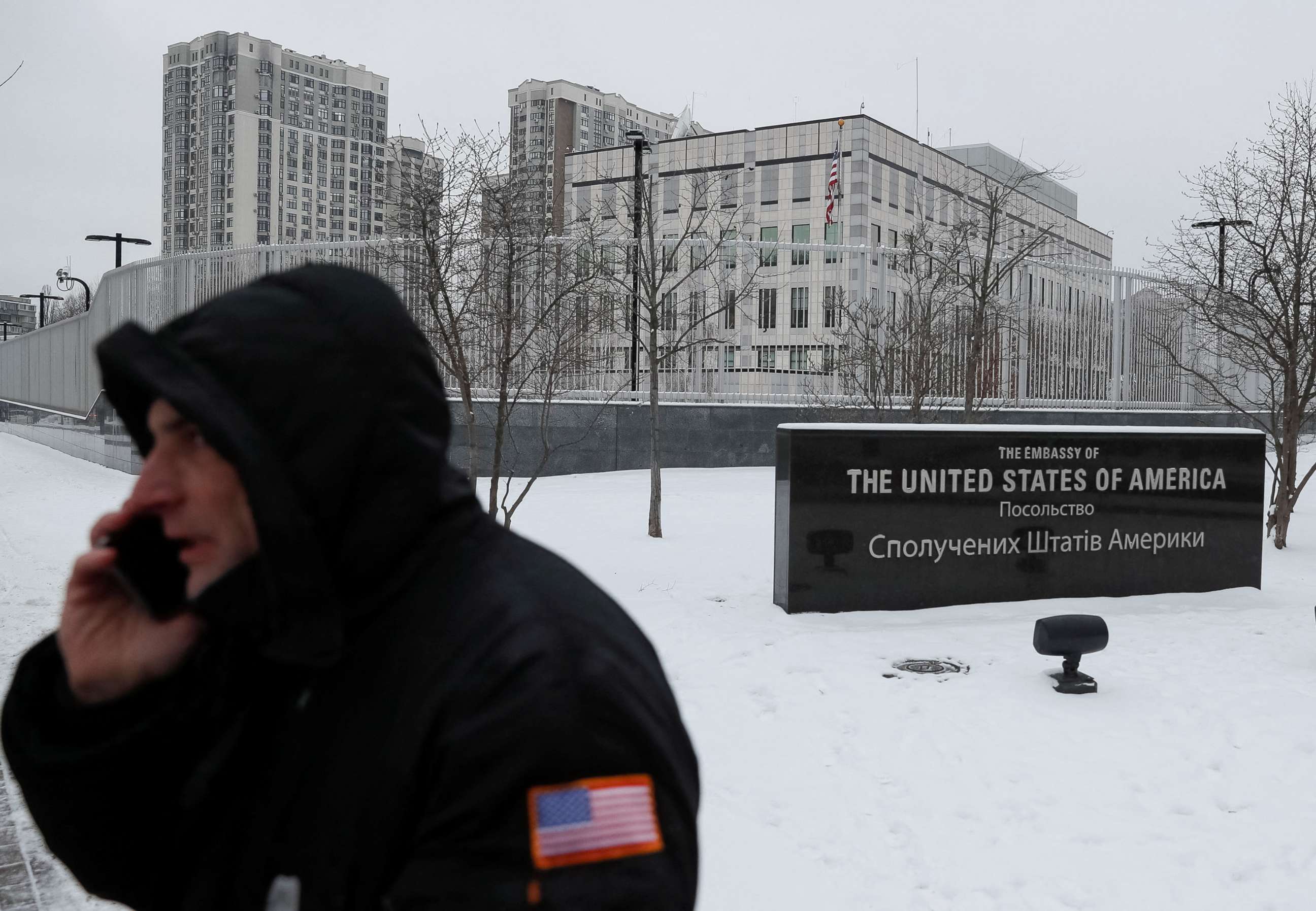 PHOTO: A security guard speaks on a mobile phone outside the U.S. embassy in Kyiv, Ukraine, Jan. 24, 2022.