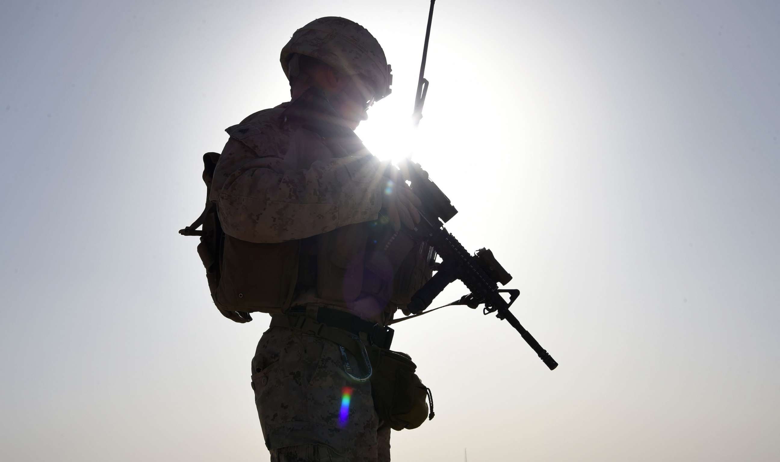 PHOTO: A U.S. soldier watches Afghan commandos take part in a combat training exercise at Shorab Military Camp in Lashkar Gah in Helmand province, Afghanistan, Aug. 27, 2017.