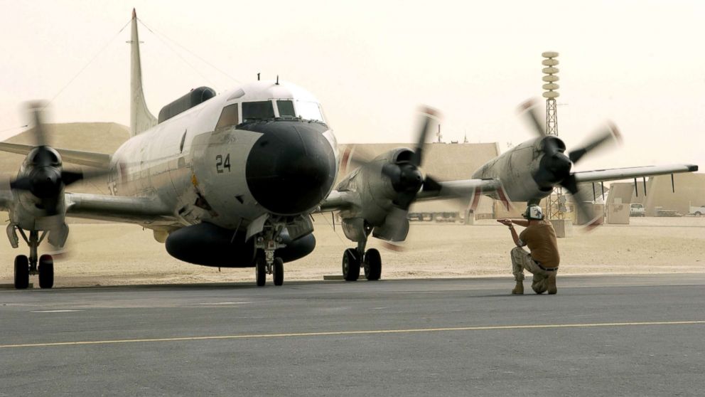 A U.S. Navy EP-3E Aries aircraft is directed by ground crew after a flight from Bahrain, Sept. 25, 2016.   