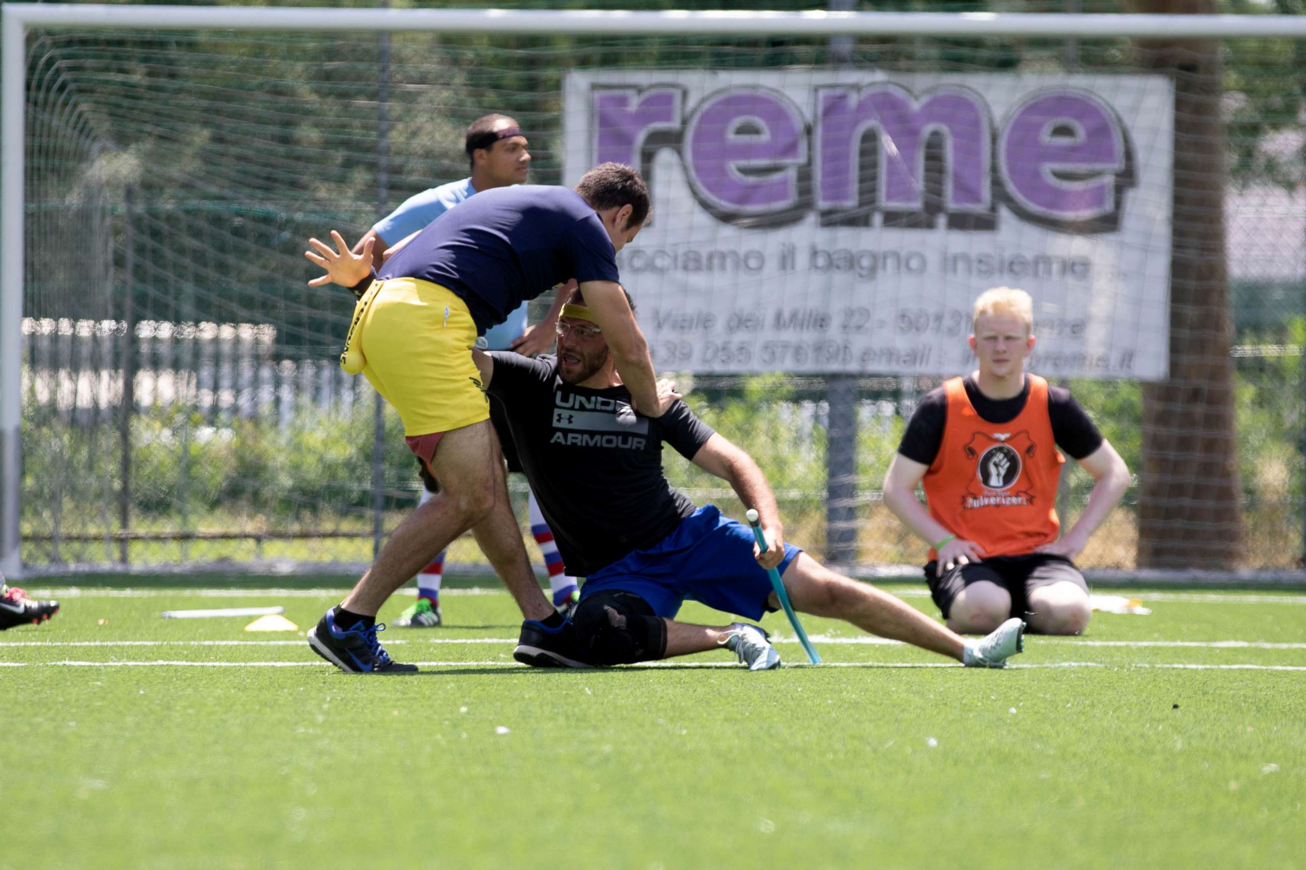 PHOTO: US Quidditch team coach Michael "Yada" Parada, left, is seen as the "snitch" alongside seeker Harry Greenhouse during practice in Florence, Italy, June 26, 2018.