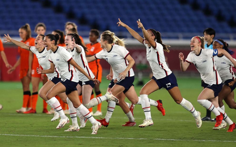 PHOTO: Players of Team United States celebrate following their team's victory in the penalty shoot out during the Women's Quarter Final match against Netherland on July 30, 2021 in Yokohama, Japan.