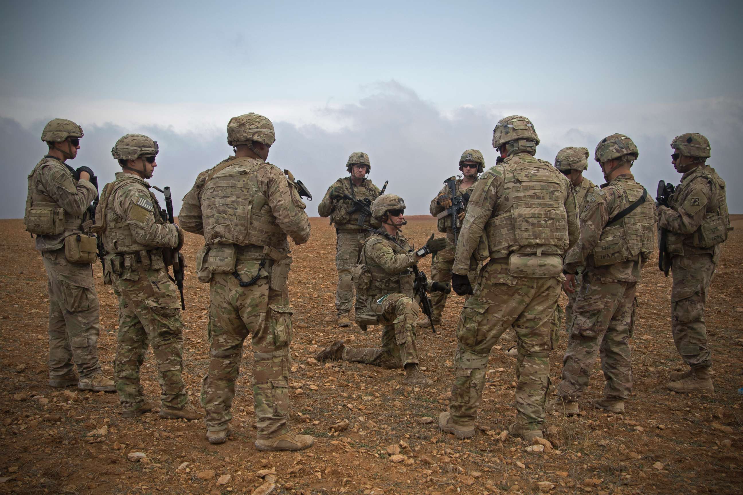 PHOTO: U.S. Soldiers gather for a brief during a combined joint patrol rehearsal in Manbij, Syria, Nov. 7, 2018.