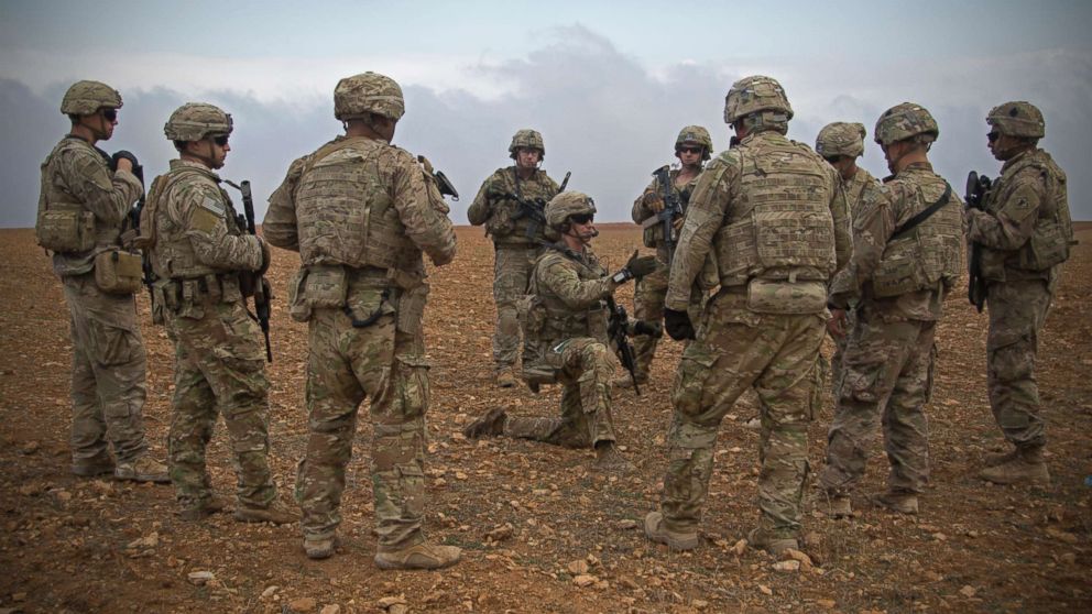 PHOTO: U.S. Soldiers gather for a brief during a combined joint patrol rehearsal in Manbij, Syria, Nov. 7, 2018.