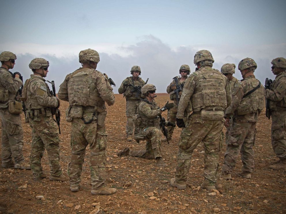 PHOTO: U.S. Soldiers gather for a brief during a combined joint patrol rehearsal in Manbij, Syria, Nov. 7, 2018.