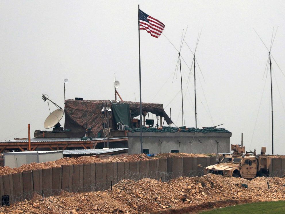 PHOTO: U.S. forces vehicles and structures are seen on the outskirts of the northern Syrian town of Manbij on Dec. 26, 2018.