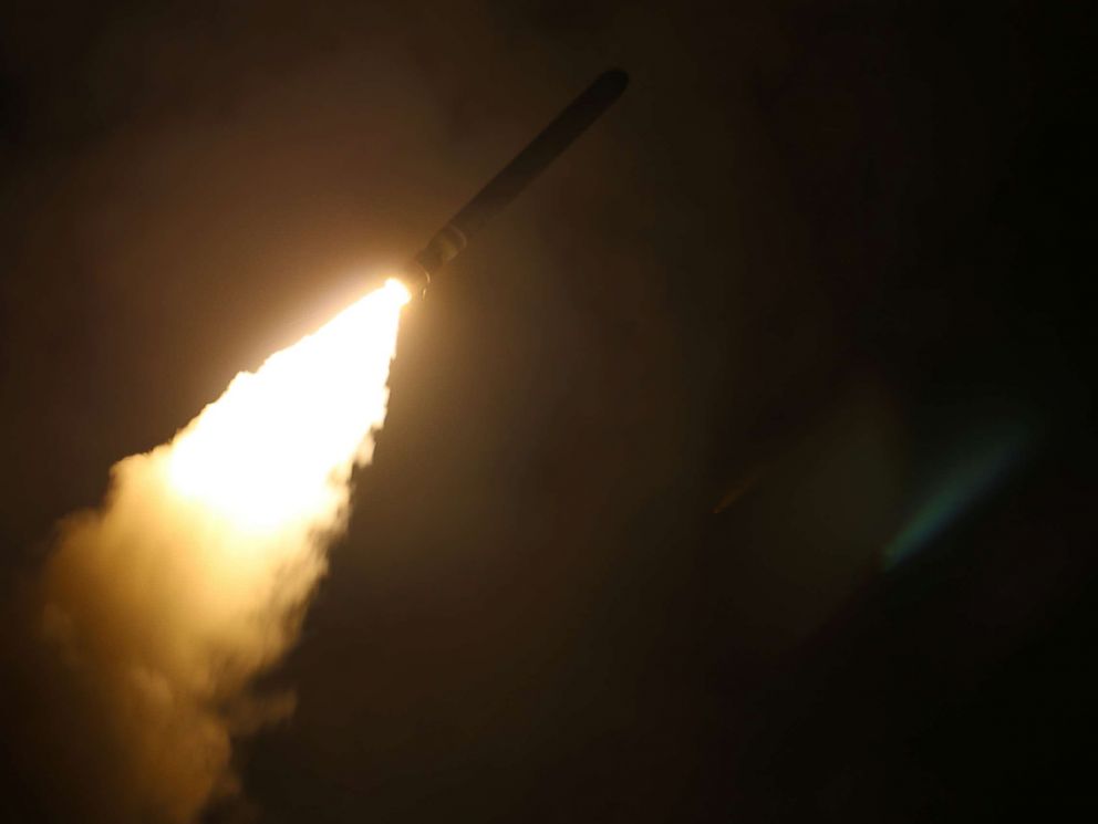 PHOTO: The U.S. Navy guided-missile cruiser USS Monterey fires a Tomahawk land attack missile in the overnight hours, April 14, 2018.