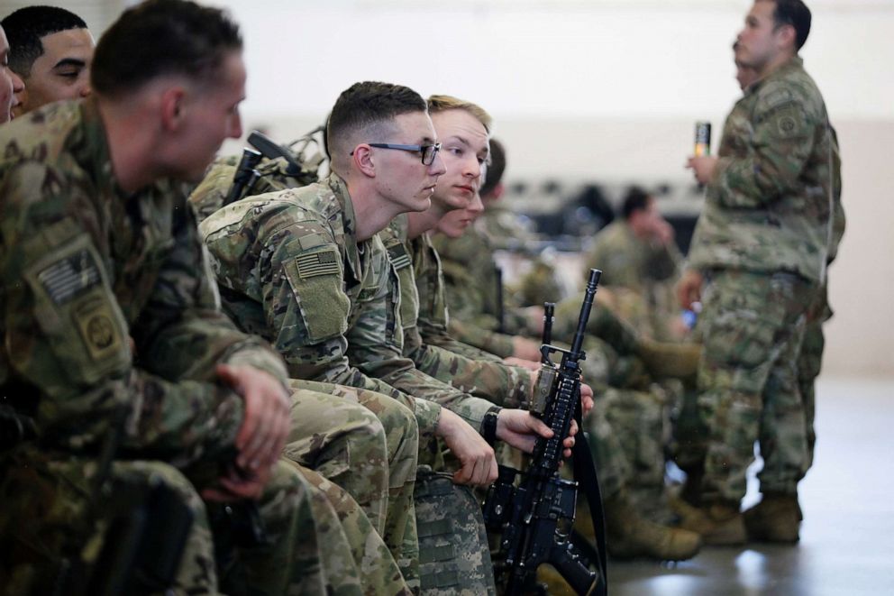 PHOTO: U.S. Army paratroopers assigned to 1st Brigade Combat Team, 82nd Airborne Division board an aircraft bound for the U.S. Central Command area of operations from Fort Bragg, North Carolina, Jan. 5, 2020.