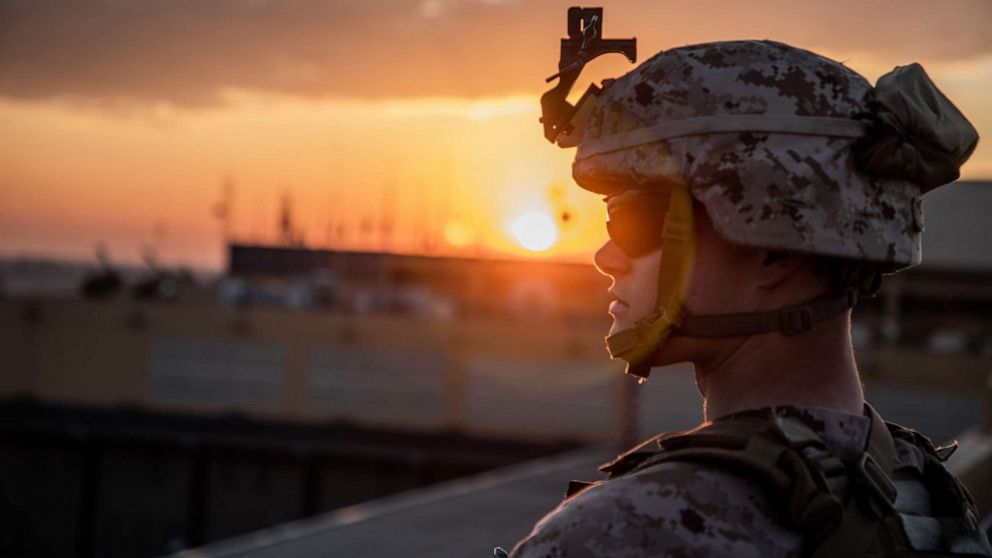 PHOTO: A U.S. Marine with 2nd Battalion, 7th Marines, assigned to the Special Purpose Marine Air-Ground Task Force-Crisis Response-Central Command 19.2, stands post during the reinforcement of the Baghdad Embassy Compound in Iraq, Jan. 4, 2020.