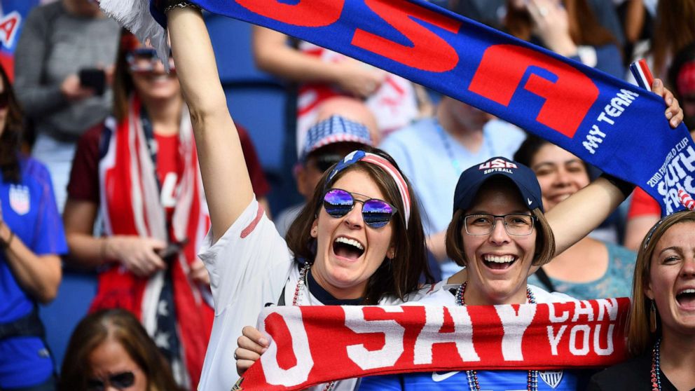 PHOTO:U.S. supporters pose at the Women's World Cup Group match between USA and Chile, June 16, 2019, at the Parc des Princes stadium in Paris.