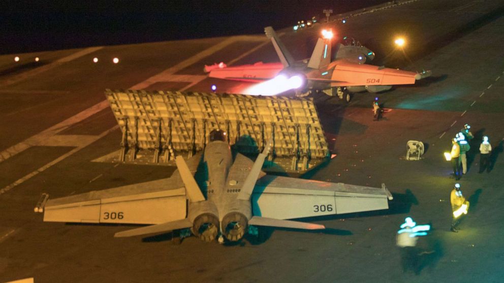 A handout photo made available by the US Navy showing a US F/A-18E Super Hornet from the 'Sidewinders' of Strike Fighter Squadron 86 launced from the flight deck of the Nimitz-class aircraft carrier USS Abraham Lincoln in the Red Sea on May 10, 2019.