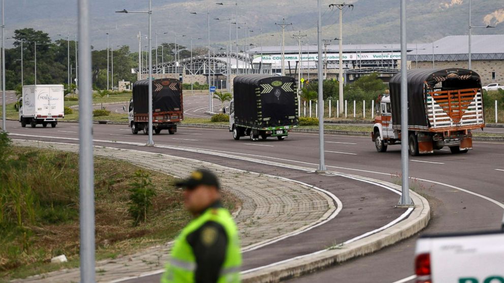 Cargo trucks containing humanitarian aid from the U.S for Venezuela arrive at the International Bridge Tienditas, near Cucuta, Colombia, on the border with Venezuela, Feb. 7, 2019. Venezuela's opposition leaders requested the shipments and vowed to bring them inside the troubled nation despite objections from embattled President Nicolas Maduro.