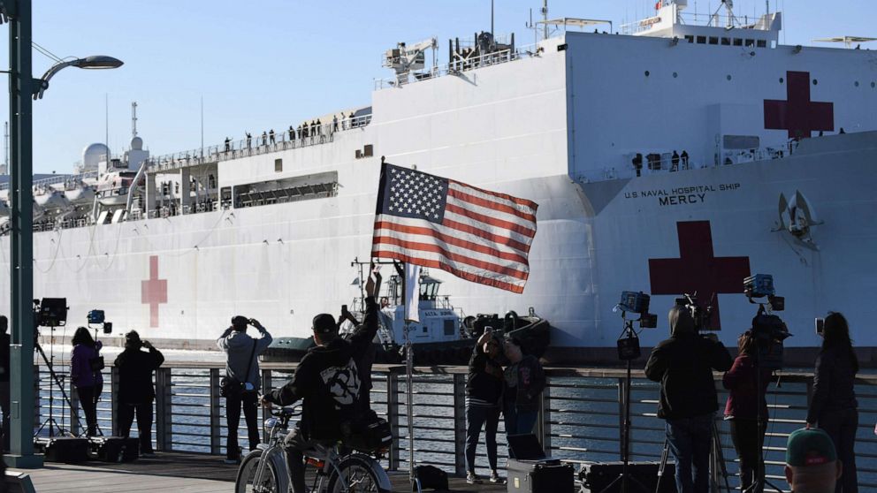 PHOTO: The U.S. Navy hospital ship Mercy arrives at the Port of Los Angeles, March 27, 2020, to help local hospitals amid the growing coronavirus crisis, in Los Angeles, Calif.