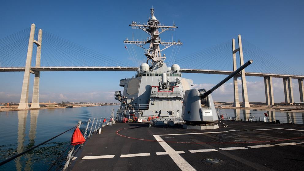 Officials say the US has shot down a Houthi missile targeting a US warship in the Red Sea