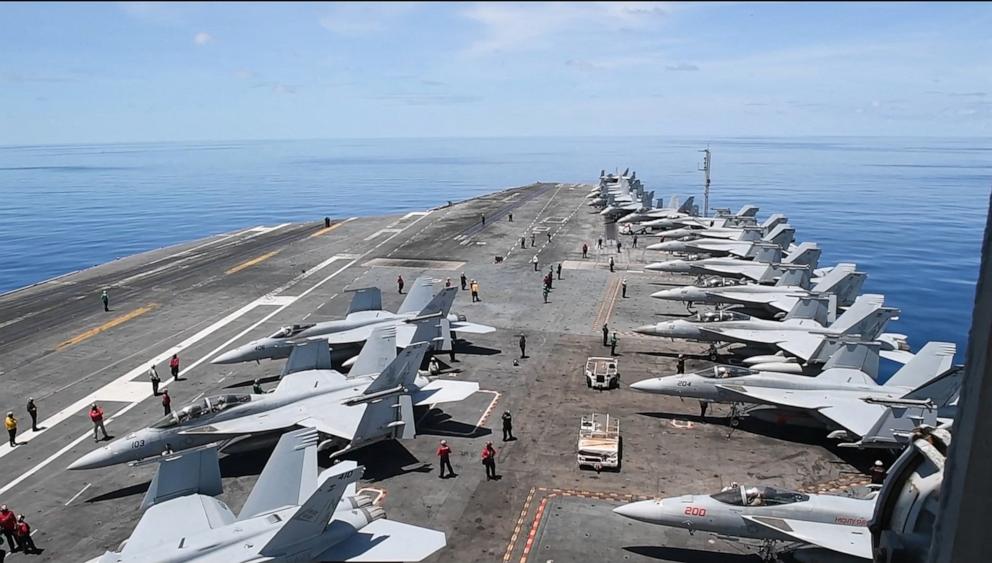 PHOTO: This handout grab taken from footage released by the US Defence Visual Information Distribution Service on June 11, 2025, shows the aircraft carrier USS Nimitz (CVN 68) conducting flight operations in the South China Sea, on May 28, 2025.