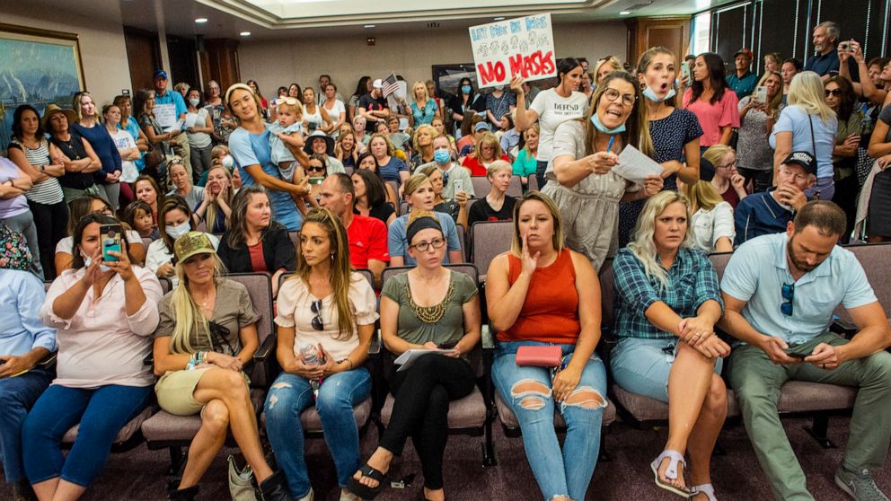 PHOTO: Angry residents react when the Utah County Commission meeting was adjourned before it even started, July 15, 2020, in Provo, Utah.