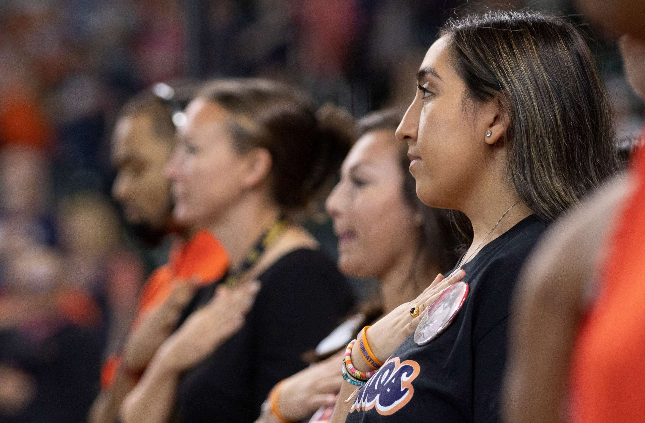 PHOTO: Uvalde resident Faith Mata takes a moment of silence for the Uvalde children that were killed in the mass shooting before the Astros versus Athletics game in Houston, Aug. 14, 2022.