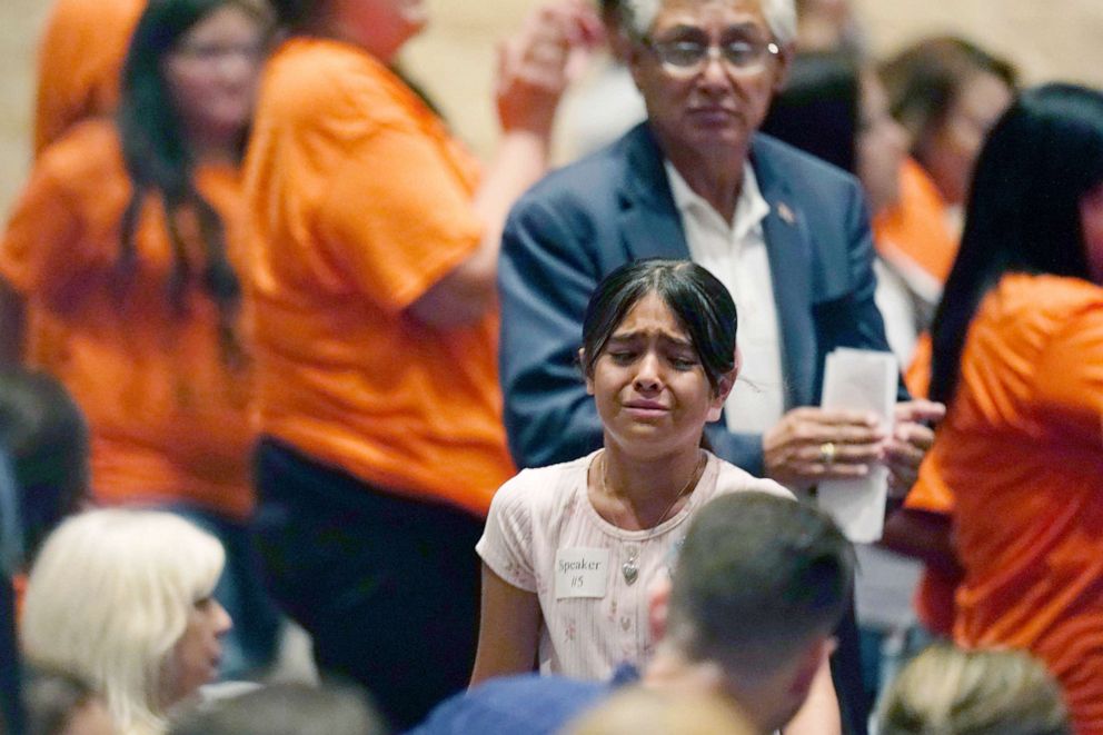 PHOTO: A student reacts after she spoke during a termination hearing to decide the fate of Uvalde School District Police Chief Pete Arredondo in Uvalde, Texas, Aug. 24, 2022.