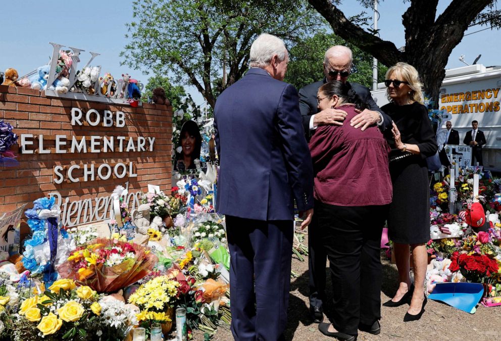 PHOTO: President Joe Biden embraces Mandy Gutierrez, Principal at Robb Elementary School, as first lady Jill Biden stands next to him, in Uvalde, Texas, May 29, 2022. 