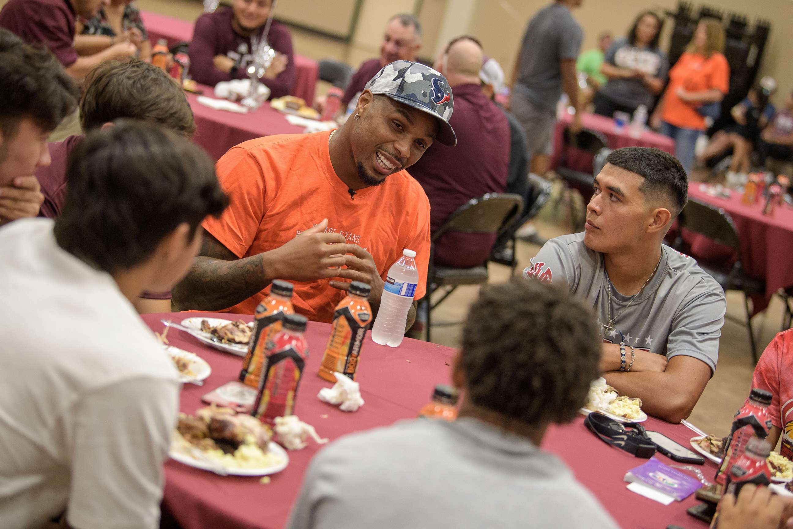 PHOTO: Houston Texans players visit the Uvalde high school football team on Sept. 1, 2022.