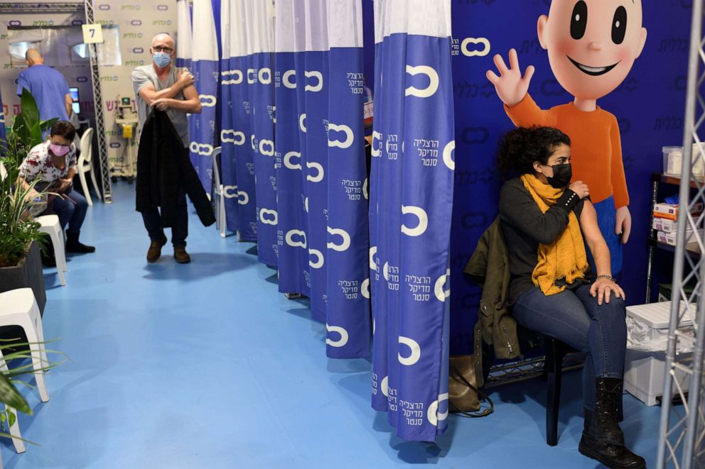 PHOTO: An Israeli woman receives a COVID-19 vaccination in a vaccination station on Jan. 16, 2021 in Herzliya, Israel.