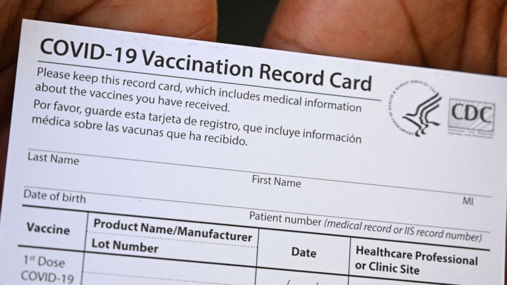 2 Michigan men charged in separate vaccination card schemes