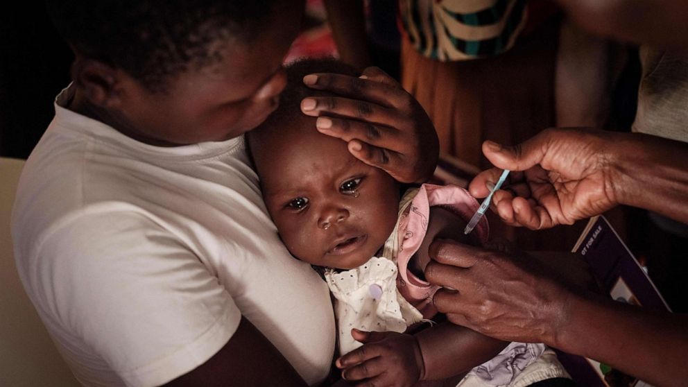 A child receives a shot during the launch of the extension of the worlds first malaria vaccine (RTS, S) pilot program for children at risk of malaria illness and death within Kenyas lake-endemic region at Kimogoi Dispensary in Gisambai, March 7, 2023.