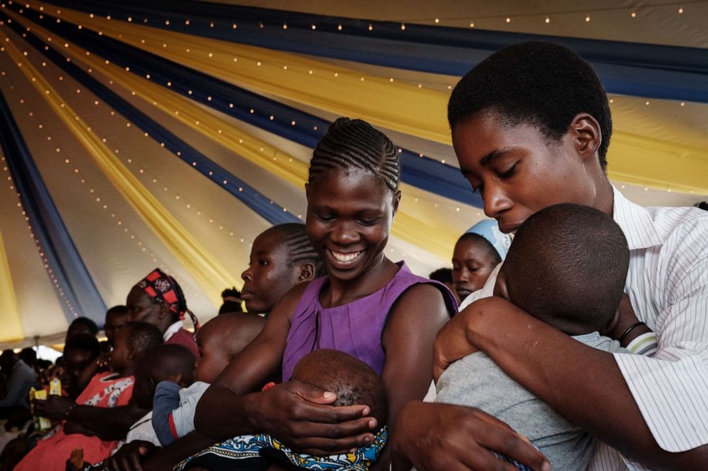 PHOTO: Mothers participate in the launch of the extension of the worlds first malaria vaccine (RTS, S) pilot program for children at risk of malaria illness and death within Kenyas lake-endemic region at Kimogoi Dispensary in Gisambai on March 7, 2023.