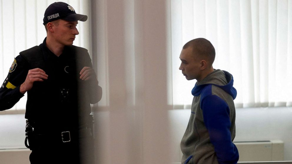 PHOTO: Russian soldier Vadim Shishimarin, 21, stands inside a cage after he was sentenced to life in prison in Kyiv, Ukraine, May 23, 2022.