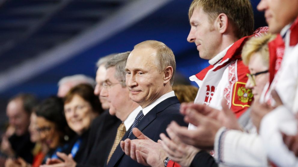 Russian President Vladimir Putin stands during the 2014 Sochi Winter Olympics Closing Ceremony at Fisht Olympic Stadium on Feb. 23, 2014, in Sochi, Russia.  