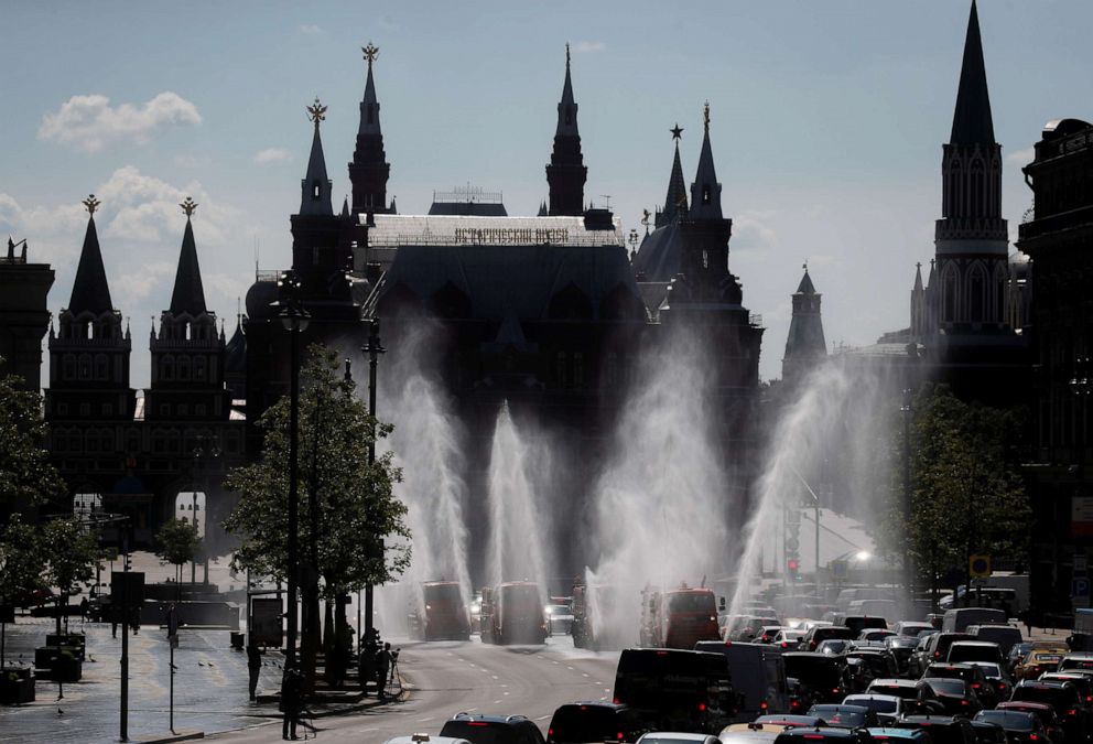 PHOTO: Vehicles spray disinfectant while sanitizing a road amid the novel coronavirus outbreak in Moscow, Russia, on May 28, 2020.