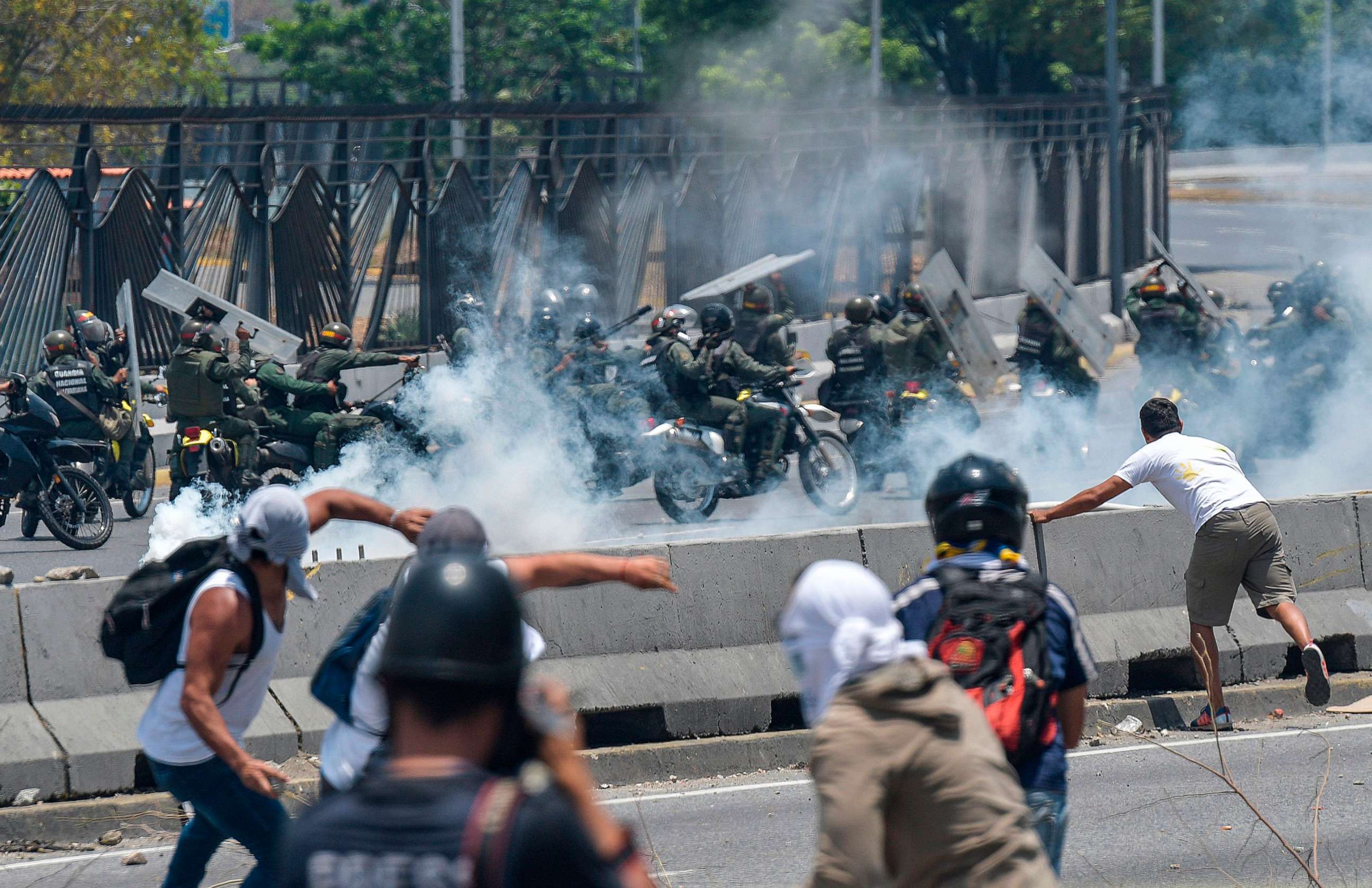 PHOTO: Anti-government protesters clash with security forces near La Carlota military base in Caracas, Venezuela during the commemoration of May Day on May 1, 2019.