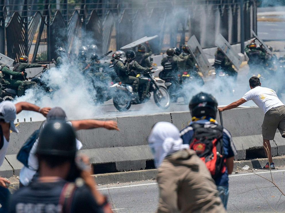 PHOTO: Anti-government protesters clash with security forces near La Carlota military base in Caracas, Venezuela during the commemoration of May Day on May 1, 2019.