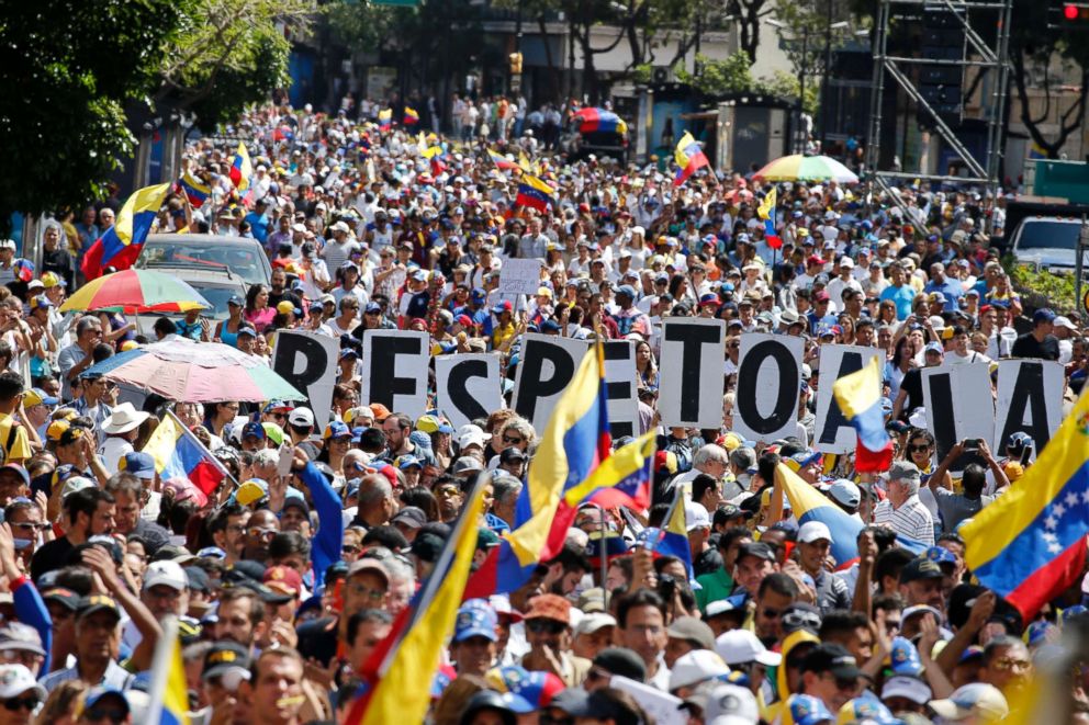 PHOTO: Hundreds of people march in Caracas, Venezuela, Feb. 12, 2019, in opposition to the government of President Maduro.