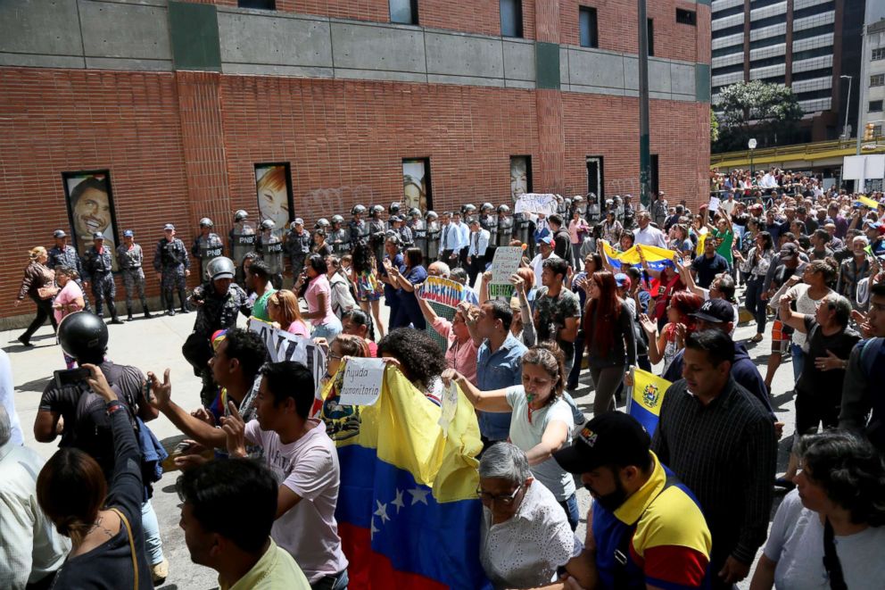 PHOTO: People protest during a demonstration against the government of President Nicolas Maduro called by the opposition leader self-proclaimed acting president Juan Guaido, Jan. 30, 2019, in Caracas, Venezuela.