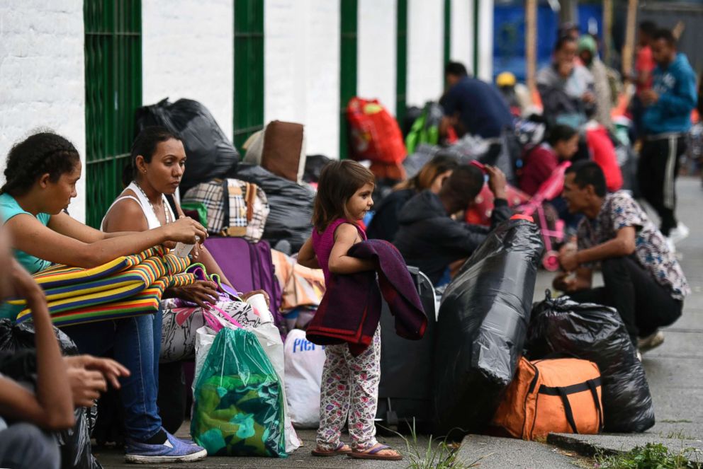 PHOTO: Venezuelan migrant families are seen at a makeshift camp alongside the Cali river in northern Cali, Colombia, on July 31, 2018.