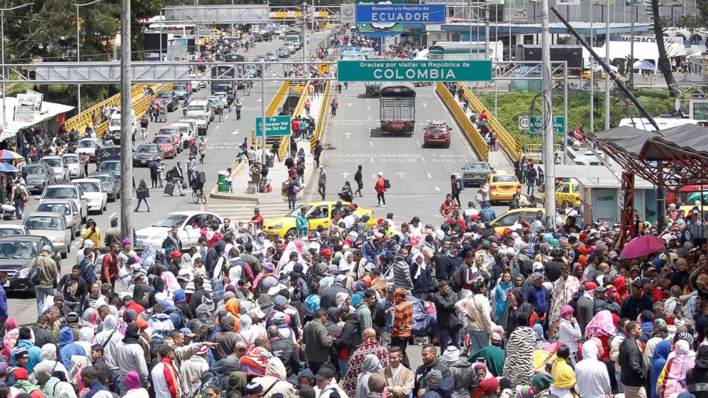 PHOTO: Venezuelan migrants stand in line to register their exit from Colombia before entering into Ecuador, at the Rumichaca International Bridge, Colombia, Aug. 9, 2018.