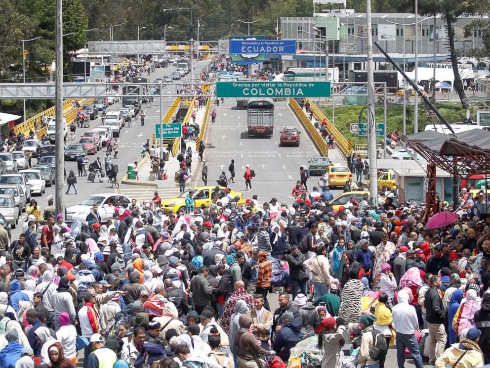 PHOTO: Venezuelan migrants stand in line to register their exit from Colombia before entering into Ecuador, at the Rumichaca International Bridge, Colombia, Aug. 9, 2018.