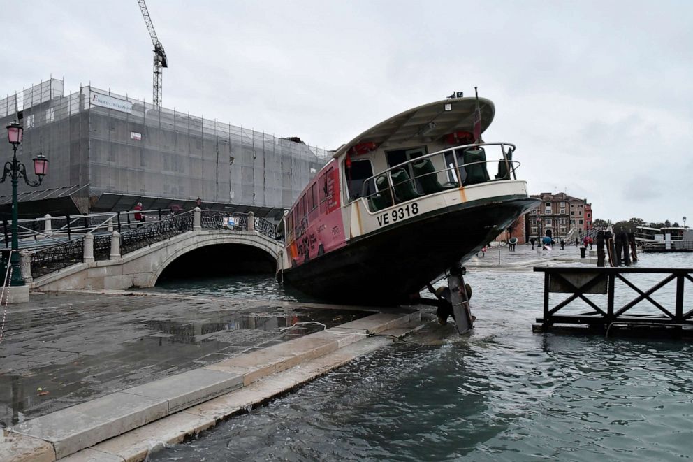 PHOTO: A stranded ferry boat lies on its side, in Venice, Nov. 13, 2019. 