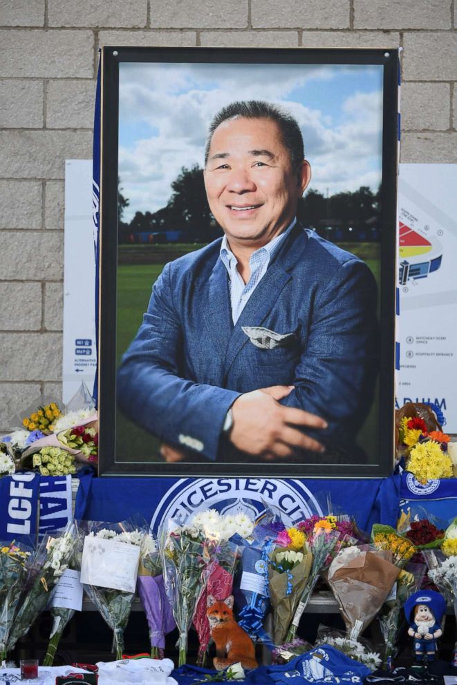 PHOTO: A portrait of Leicester City Football Club's Thai chairman Vichai Srivaddhanaprabha, is seen with flowers and tributes outside the King Power Stadium in Leicester, England, Oct. 29, 2018.