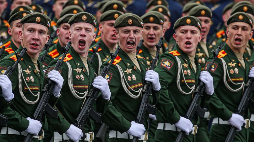 PHOTO: Soldiers march during the military parade marking the 76th anniversary of the Soviet victory in the Great Patriotic War, Russia's term for World War II, on Red Square in Moscow, May 9, 2021.
