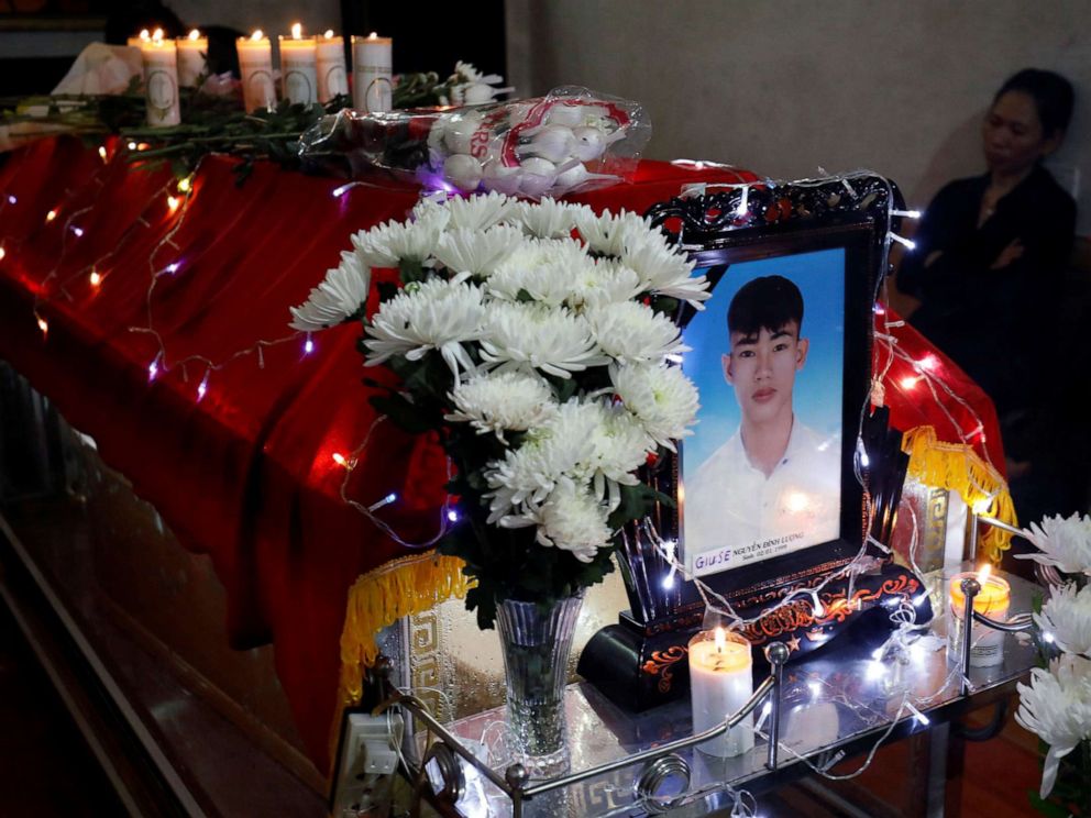 PHOTO: Relatives of Joseph Nguyen Dinh Luong, one of the Vietnamese people found dead aboard a lorry in Britain, attend a funeral mass in Nghe An province, Vietnam Nov. 27, 2019.