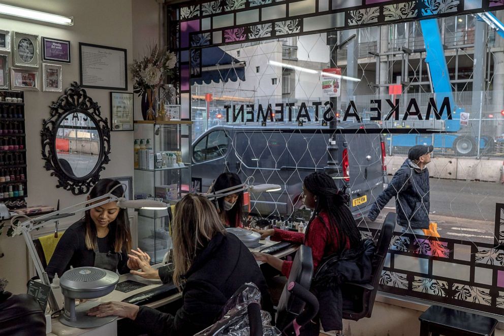 PHOTO: Women work in a Vietnamese-owned nail salon in the Tottenham district of London on Dec. 16, 2017.