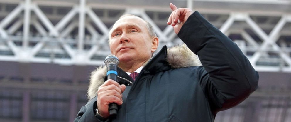 PHOTO: Russian President Vladimir Putin delivers a speech during a rally to support his bid in the upcoming presidential election, at Luzhniki Stadium in Moscow, March 3, 2018.