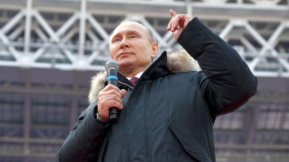 PHOTO: Russian President Vladimir Putin delivers a speech during a rally to support his bid in the upcoming presidential election, at Luzhniki Stadium in Moscow, March 3, 2018.