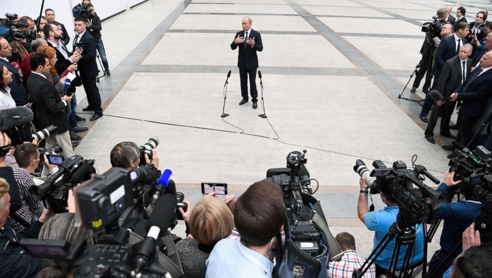 PHOTO: Russian President Vladimir Putin speaks with journalists shortly after his annual televised phone-in with the nation, June 7, 2018, in Moscow.