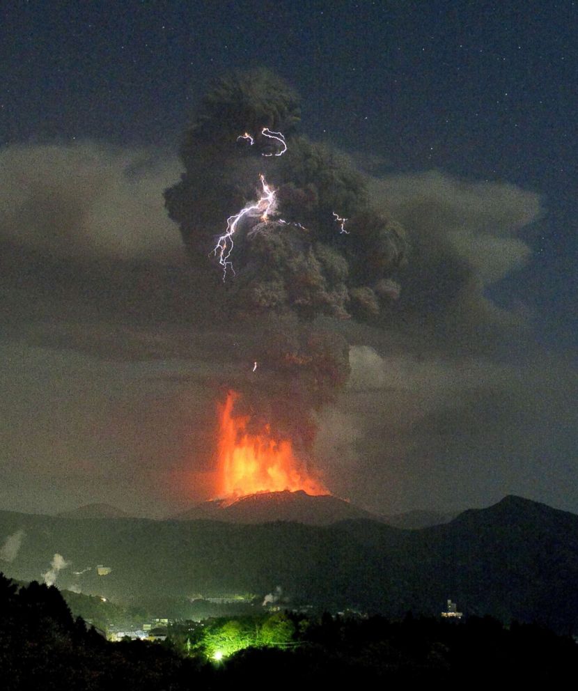 PHOTO: Lightning lights up the ash cloud above Shinmoedake peak as the volcano erupts between Miyazaki and Kagoshima prefectures, southwestern Japan, in a photo taken by a remote camera and released by Kyodo News, April 5, 2018.