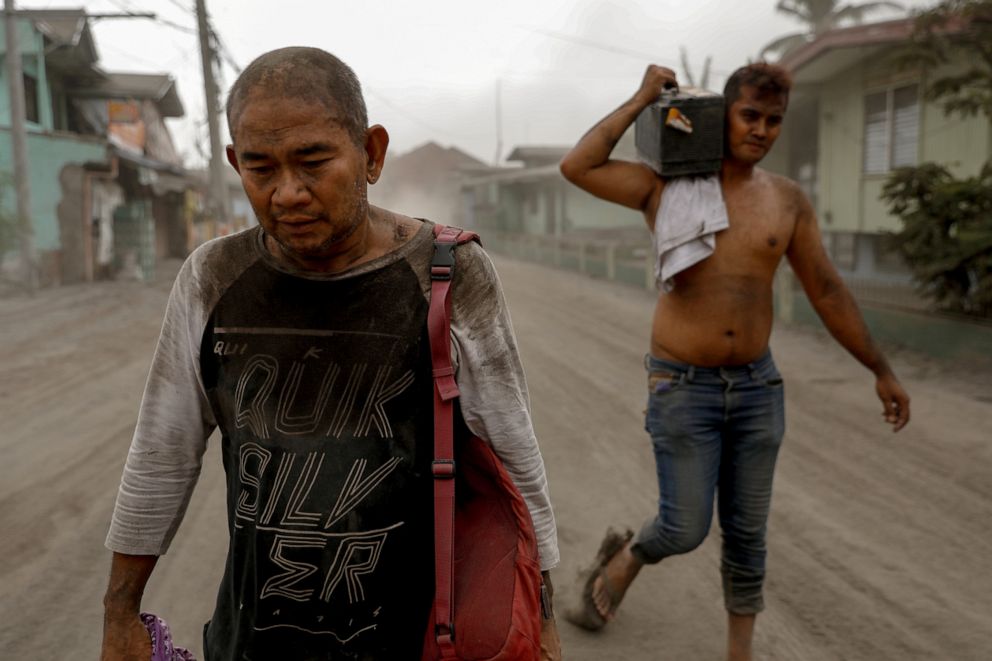 PHOTO: Residents living near the errupting Taal Volcano evacuate in Batangas City, Philippines, Jan. 13, 2020. 