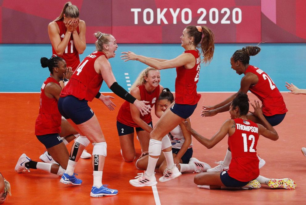 PHOTO: The USA team celebrates after defeating Brazil in straight sets, 25-21, 25-20 and 25-14 to win the gold medal in Women's Volleyball at the Tokyo Summer Olympics in Tokyo, Japan on August 8, 2021.